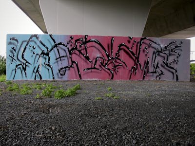 Light Blue and Red and Black Stylewriting by Kezam. This Graffiti is located in Auckland, New Zealand and was created in 2023. This Graffiti can be described as Stylewriting and 3D.