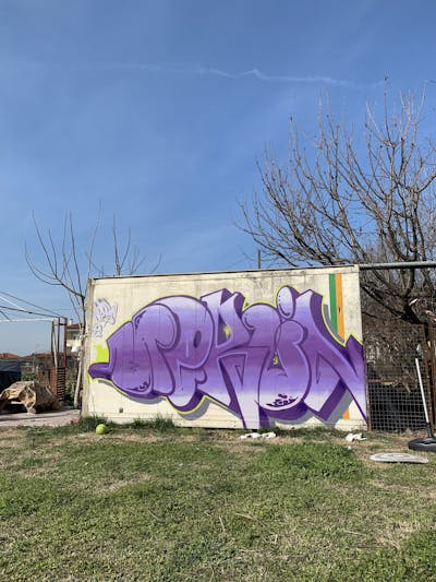 Violet Stylewriting by Merlin. This Graffiti is located in Katerini, Greece and was created in 2022. This Graffiti can be described as Stylewriting and Street Bombing.
