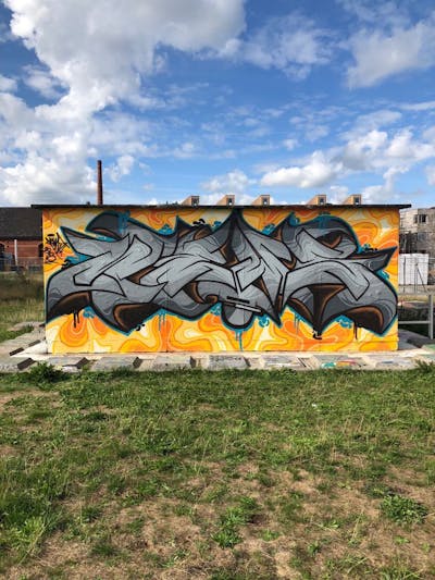 Grey and Orange Stylewriting by News. This Graffiti is located in Groningen, Netherlands and was created in 2019. This Graffiti can be described as Stylewriting and Wall of Fame.