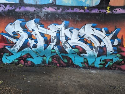 White and Cyan and Colorful Stylewriting by LORD. This Graffiti is located in Caen, France and was created in 2023.
