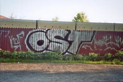 Chrome Stylewriting by urine, Kodak and OST. This Graffiti is located in Delitzsch, Germany and was created in 2008. This Graffiti can be described as Stylewriting and Street Bombing.