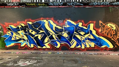 Beige and Blue Stylewriting by Techno and CAS. This Graffiti is located in London, United Kingdom and was created in 2021. This Graffiti can be described as Stylewriting and Wall of Fame.