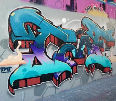 Cyan and Violet and Red Wall of Fame by Chr15 and TMF. This Graffiti is located in Leipzig, Germany and was created in 2023. This Graffiti can be described as Wall of Fame and Stylewriting.