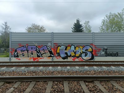 Colorful and Red Stylewriting by 689, 689ers and Hmas. This Graffiti is located in Germany and was created in 2023. This Graffiti can be described as Stylewriting and Line Bombing.
