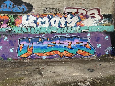 Cyan and Orange and Coralle Stylewriting by Muser. This Graffiti is located in Leipzig, Germany and was created in 2024. This Graffiti can be described as Stylewriting and Abandoned.