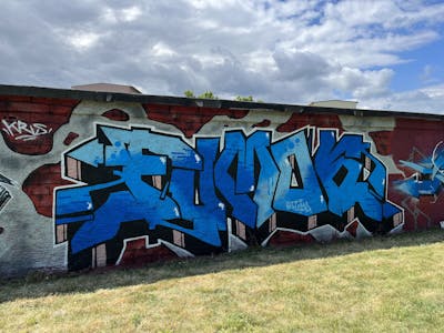Blue and Colorful Stylewriting by Fumok. This Graffiti is located in Leipzig, Germany and was created in 2022.
