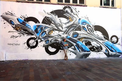 Grey and Black and Light Blue Stylewriting by Nelson. This Graffiti is located in Mulhouse, France and was created in 2023. This Graffiti can be described as Stylewriting, 3D and Atmosphere.