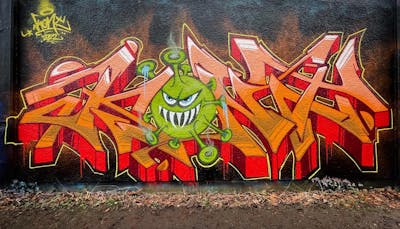 Orange and Red Stylewriting by KonT. This Graffiti is located in Lüdenscheid, Germany and was created in 2022. This Graffiti can be described as Stylewriting and Characters.