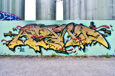 Beige and Cyan Stylewriting by Aromad. This Graffiti is located in Bern, Switzerland and was created in 2021. This Graffiti can be described as Stylewriting and Wall of Fame.