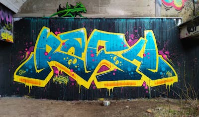 Cyan and Yellow Stylewriting by Rash and HAMPI. This Graffiti is located in Dortmund, Germany and was created in 2022. This Graffiti can be described as Stylewriting and Abandoned.