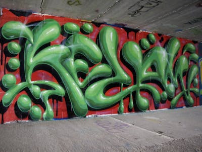 Light Green and Red Stylewriting by Kezam. This Graffiti is located in Auckland, New Zealand and was created in 2022. This Graffiti can be described as Stylewriting, 3D and Abandoned.