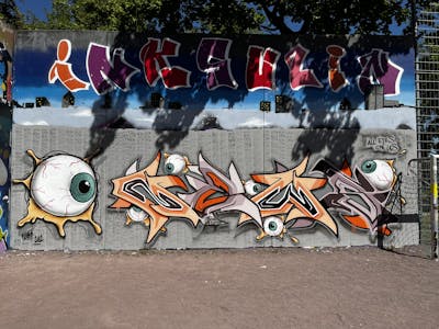 Colorful and Grey Stylewriting by News and Cramp. This Graffiti is located in Regensburg, Germany and was created in 2022. This Graffiti can be described as Stylewriting, Characters and Wall of Fame.