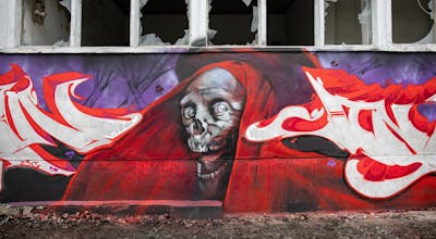 Red and Violet and Grey Characters by Cors One. This Graffiti is located in Berlin, Germany and was created in 2023. This Graffiti can be described as Characters and Abandoned.