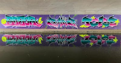 Cyan and Coralle and Violet Stylewriting by Zebor, Char, smo__crew and Toile. This Graffiti is located in Wolverhampton, United Kingdom and was created in 2022. This Graffiti can be described as Stylewriting and Wall of Fame.