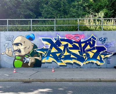 Colorful Stylewriting by Rotz and Care. This Graffiti is located in Ingolstadt, Germany and was created in 2022. This Graffiti can be described as Stylewriting, Characters and Wall of Fame.