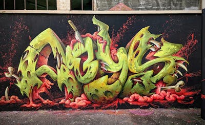 Light Green and Red Stylewriting by Abys. This Graffiti is located in Nancy, France and was created in 2022. This Graffiti can be described as Stylewriting and Characters.