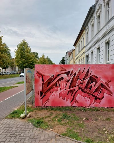 Coralle and Red Stylewriting by Shew, the Buddys and Büro21. This Graffiti is located in Strausberg, Germany and was created in 2022. This Graffiti can be described as Stylewriting and Commission.