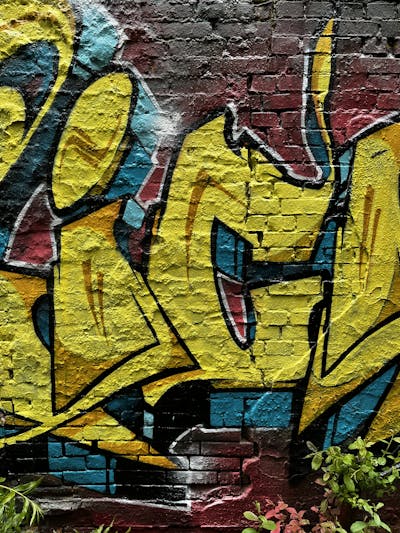 Yellow and Cyan Stylewriting by ZICK and PMZ CREW. This Graffiti is located in Oldenburg, Germany and was created in 2023. This Graffiti can be described as Stylewriting and Abandoned.