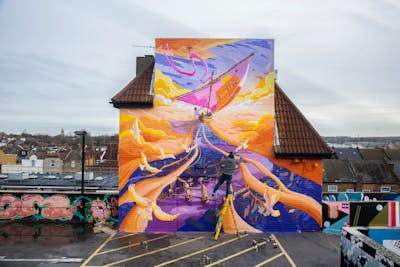 Orange and Violet Characters by Tris. This Graffiti is located in Penge west London, United Kingdom and was created in 2024. This Graffiti can be described as Characters, Streetart and Murals.