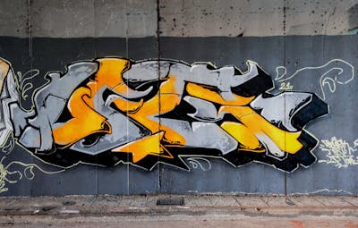 Grey and Orange and Black Stylewriting by SparkTwo and LFT. This Graffiti is located in Agrinio, Greece and was created in 2021.