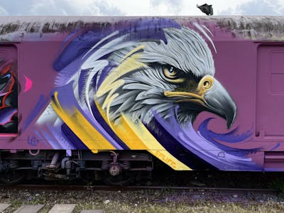 Violet and Yellow and Grey Characters by spliff one and LS Crew. This Graffiti is located in Salzburg, Austria and was created in 2023. This Graffiti can be described as Characters and Trains.