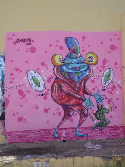 Coralle and Colorful Characters by Pun18 and ADM. This Graffiti is located in San Juan, Puerto Rico and was created in 2011. This Graffiti can be described as Characters and Wall of Fame.