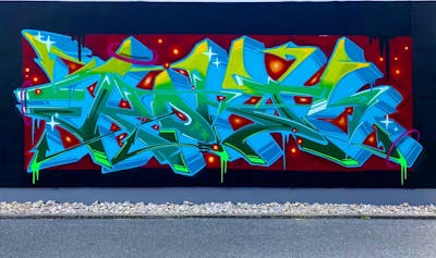 Light Blue and Light Green and Red Stylewriting by KonT. This Graffiti is located in Lüdenscheid, Germany and was created in 2022. This Graffiti can be described as Stylewriting and Wall of Fame.