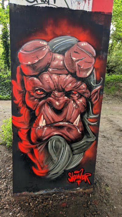 Grey and Red and Black Characters by SQWR. This Graffiti is located in United Kingdom and was created in 2023.