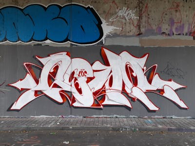 Red and White and Grey Stylewriting by Sewo43. This Graffiti is located in Germany and was created in 2022. This Graffiti can be described as Stylewriting and Wall of Fame.