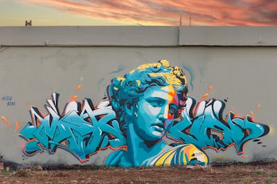 Cyan and Colorful Stylewriting by Merlin and bzks. This Graffiti is located in Vrontou Pierias, Greece and was created in 2024. This Graffiti can be described as Stylewriting, Characters and Streetart.