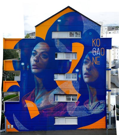 Orange and Blue Characters by Koga one. This Graffiti is located in saint brieuc, France and was created in 2021. This Graffiti can be described as Characters and Murals.