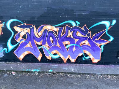 Violet and Colorful Stylewriting by MOKE. This Graffiti is located in Berlin, Germany and was created in 2020. This Graffiti can be described as Stylewriting and Wall of Fame.