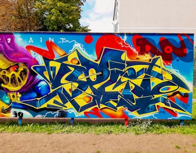 Colorful and Blue Stylewriting by split. This Graffiti is located in Germany and was created in 2022. This Graffiti can be described as Stylewriting, Characters and Wall of Fame.