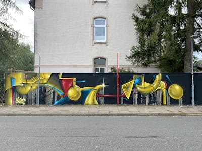 Yellow and Colorful 3D by Aksid. This Graffiti is located in Lüneburg, Germany and was created in 2023. This Graffiti can be described as 3D and Streetart.