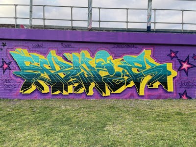 Yellow and Cyan Stylewriting by Techno and CAS. This Graffiti is located in London, United Kingdom and was created in 2021. This Graffiti can be described as Stylewriting and Characters.