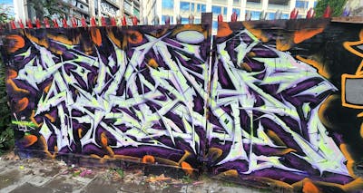 White and Violet and Orange Stylewriting by Kuhr. This Graffiti is located in Ireland and was created in 2023.