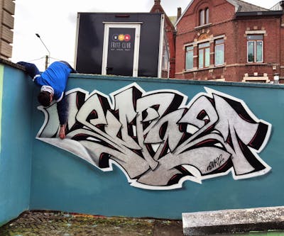 Chrome and Cyan and Black Stylewriting by SUR2. This Graffiti is located in Belgium, Belgium and was created in 2023. This Graffiti can be described as Stylewriting and Streetart.