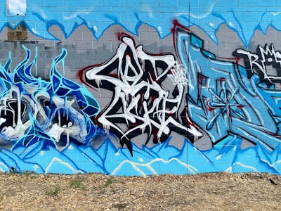 Grey and Light Blue Stylewriting by OZAI. This Graffiti is located in Perth, Australia and was created in 2022.