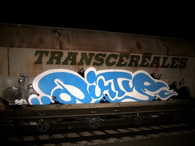 Light Blue and White and Black Freights by DirtY Deeds. This Graffiti is located in Venice, Italy and was created in 2023. This Graffiti can be described as Freights, Trains and Stylewriting.