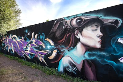 Colorful Stylewriting by Mon, Cors One and Wave Nine. This Graffiti is located in Berlin, Germany and was created in 2022. This Graffiti can be described as Stylewriting, Characters and Wall of Fame.