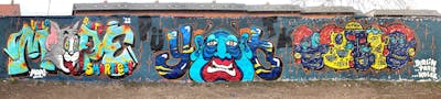Colorful Stylewriting by Hülpman, OST, PÜTK, Mope and Yat. This Graffiti is located in Berlin, Germany and was created in 2022. This Graffiti can be described as Stylewriting, Characters and Wall of Fame.