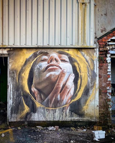 Gold and Beige Characters by liambononi. This Graffiti is located in Liverpool, United Kingdom and was created in 2022. This Graffiti can be described as Characters, Murals and Abandoned.