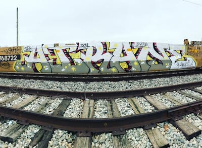 Grey and Yellow Stylewriting by Air Crew, 247 and RANE1. This Graffiti is located in Chicago, United States and was created in 2023. This Graffiti can be described as Stylewriting and Line Bombing.