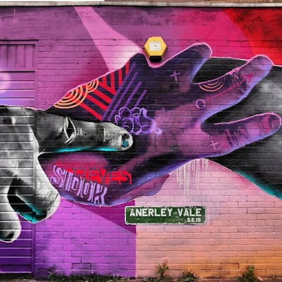 Violet and Coralle and Grey Characters by Reves and SIDOK. This Graffiti is located in London, United Kingdom and was created in 2023. This Graffiti can be described as Characters and Murals.