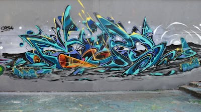 Cyan and Black and Grey Stylewriting by Chips and CDSK. This Graffiti is located in London, United Kingdom and was created in 2023. This Graffiti can be described as Stylewriting and Wall of Fame.