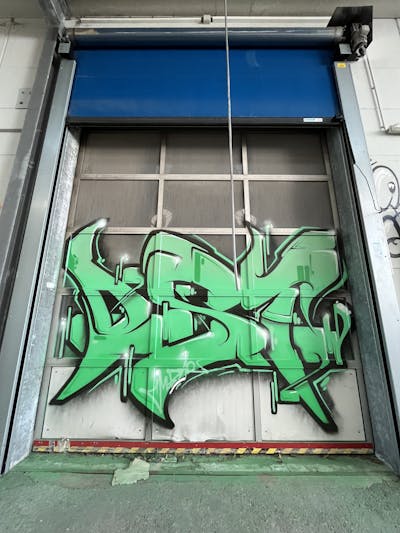 Light Green and Black Stylewriting by mobar and OST. This Graffiti is located in München, Germany and was created in 2023. This Graffiti can be described as Stylewriting and Abandoned.