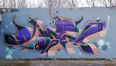 Beige and Violet Stylewriting by Roweo and mtl crew. This Graffiti is located in Saalfeld (Saale), Germany and was created in 2022. This Graffiti can be described as Stylewriting and Wall of Fame.