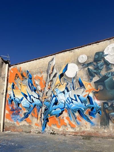 Light Blue and Orange and Blue Stylewriting by Sowet. This Graffiti is located in Florence, Italy and was created in 2023. This Graffiti can be described as Stylewriting, Characters and Abandoned.