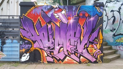 Violet and Coralle and Colorful Stylewriting by Hu-Man. This Graffiti is located in Hamburg, Germany and was created in 2024. This Graffiti can be described as Stylewriting and Characters.