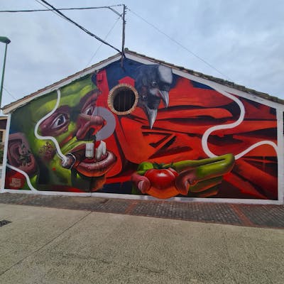 Red and Light Green Characters by Nexgraff. This Graffiti is located in Larraga, Spain and was created in 2021. This Graffiti can be described as Characters, 3D and Murals.